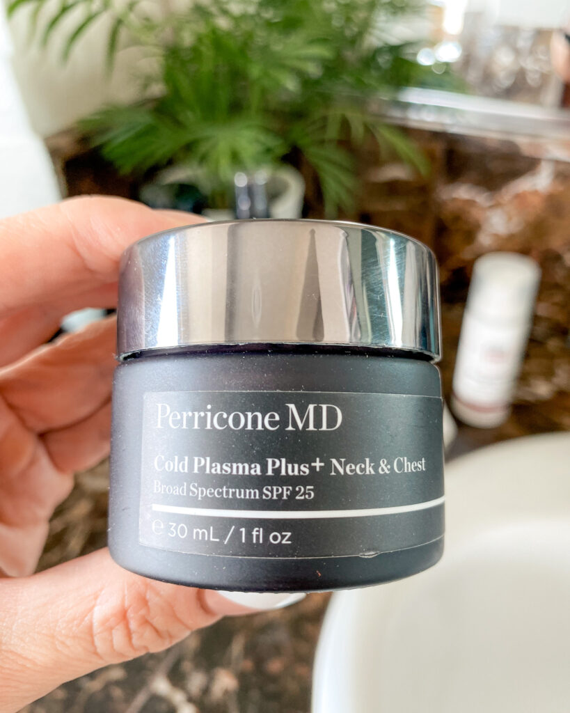 perricone MD neck & chest moisturizer, neck moisturizer, chest moisturizer, dark grey packaging, circle container, chrome lid 