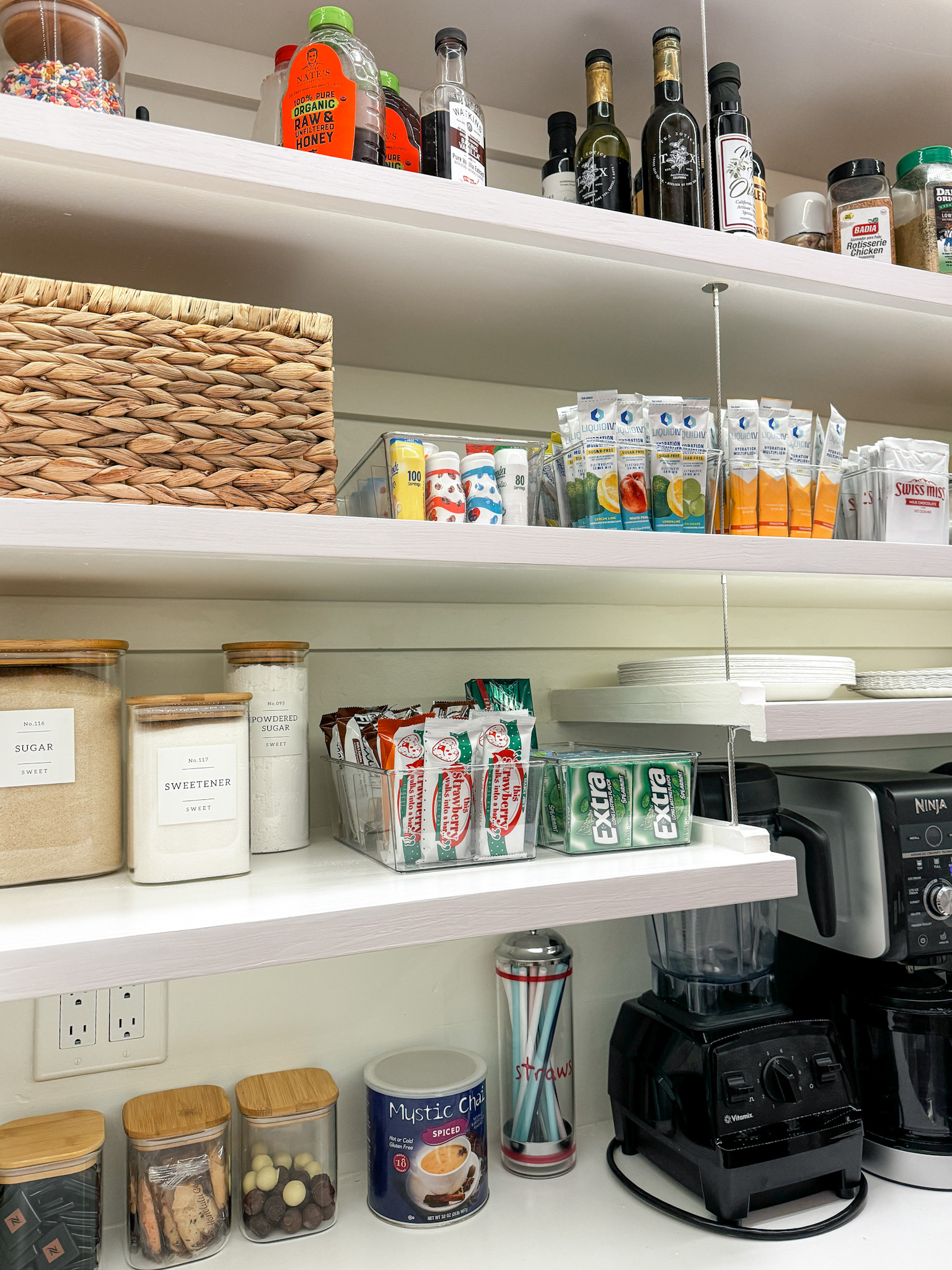 unlocking pantry perfection: insider look into a clutter-free kitchen | pantry, pantry organization, clutter-free, kitchen, lazy susan, basket, storage finds, clear organizer, minimalist label