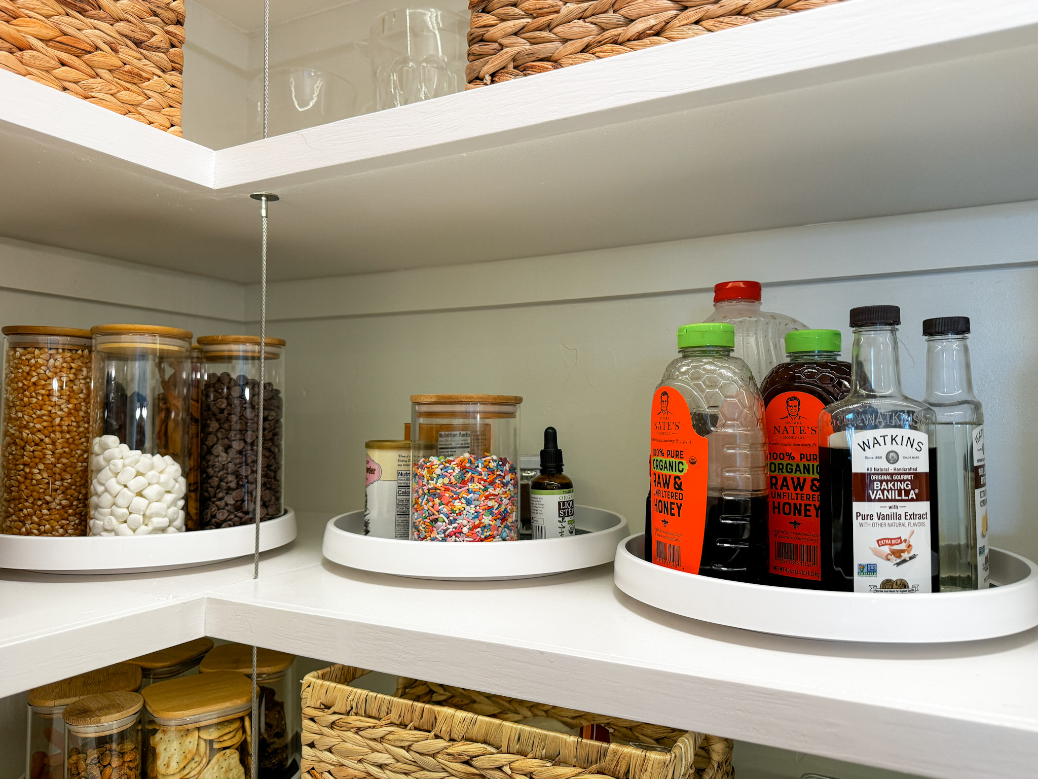 unlocking pantry perfection: insider look into a clutter-free kitchen | pantry, pantry organization, clutter-free, kitchen, lazy susan, food storage, clear containers, container