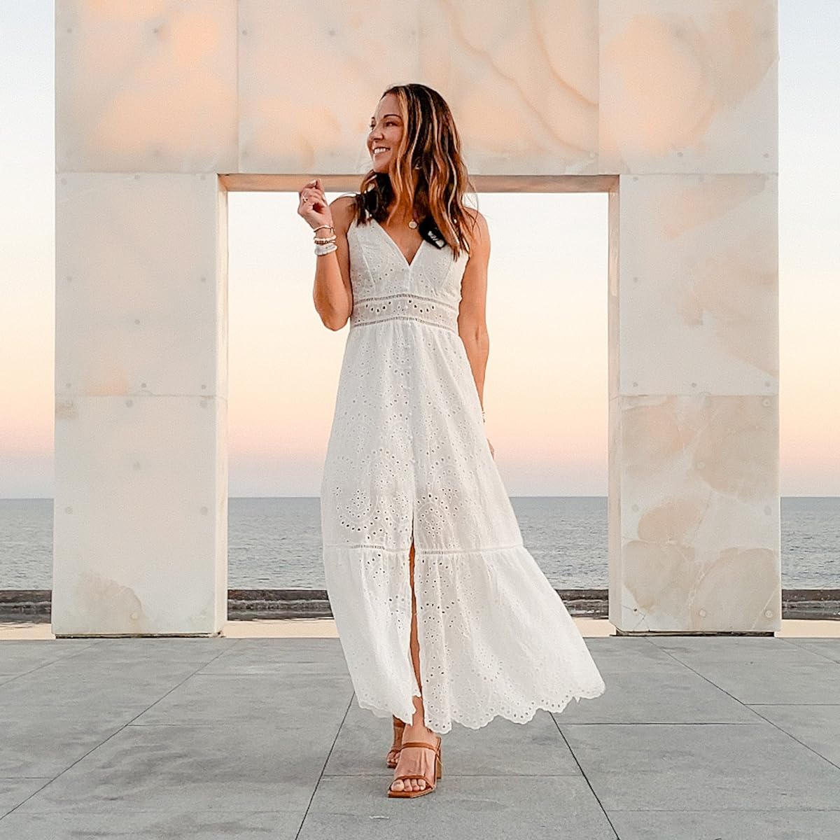 Spring into the season with these must-see dresses, accessories, and more | spring, spring fashion, spring dress, spring dresses, maxi dress, white dress, spaghetti strap, heel, neutral fashion, resort wear, vacation outfit