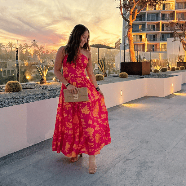 the ultimate girls trip to cabo come with me | girls trip, cabo, resort, spa resort, mexico, resort wear, vacation outfit, clutch, rattan, floral dress, heels, accessories, sunset, dinner outfit, girls night out
