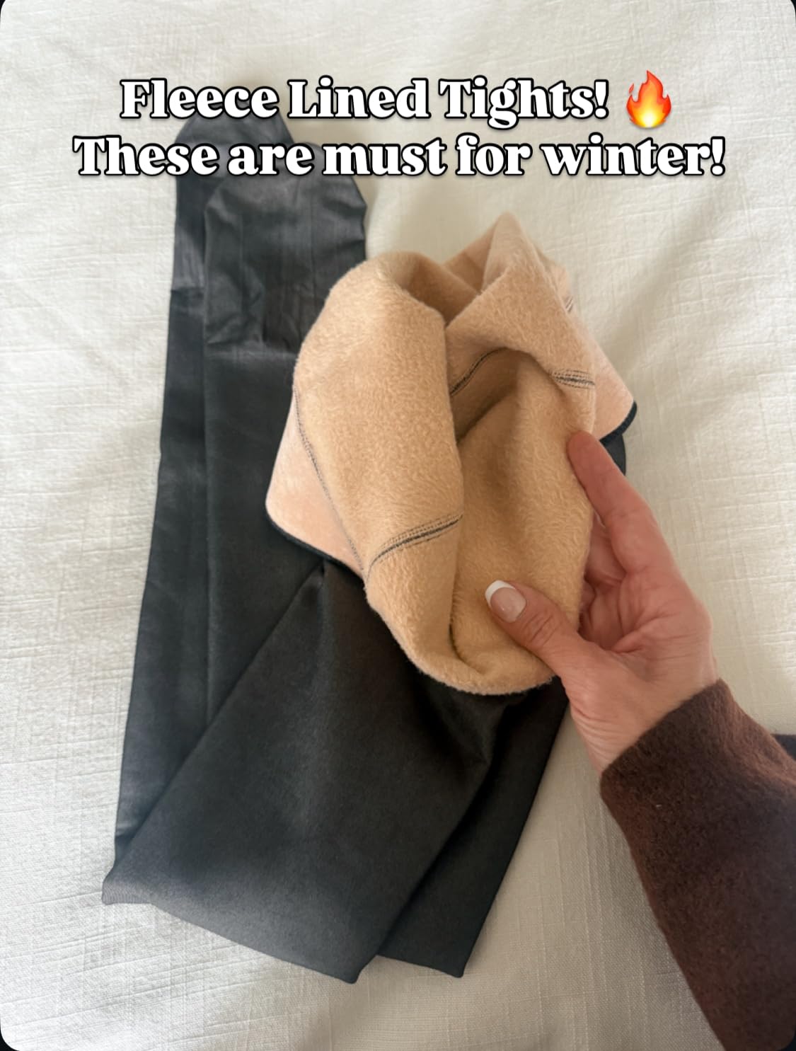 Fleece-lined black tights with a soft beige fleece interior, a winter wardrobe essential for wearing dresses and skirts in cold weather.
